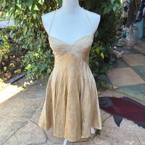Elegant Gold Lace Fit-and-Flare Spaghetti Strap Dress